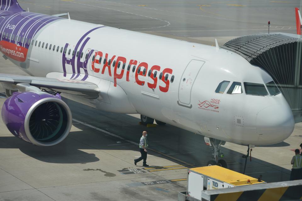 An A320 passenger jet operated by budget carrier HK Express gets ready to take off for an inaugural 