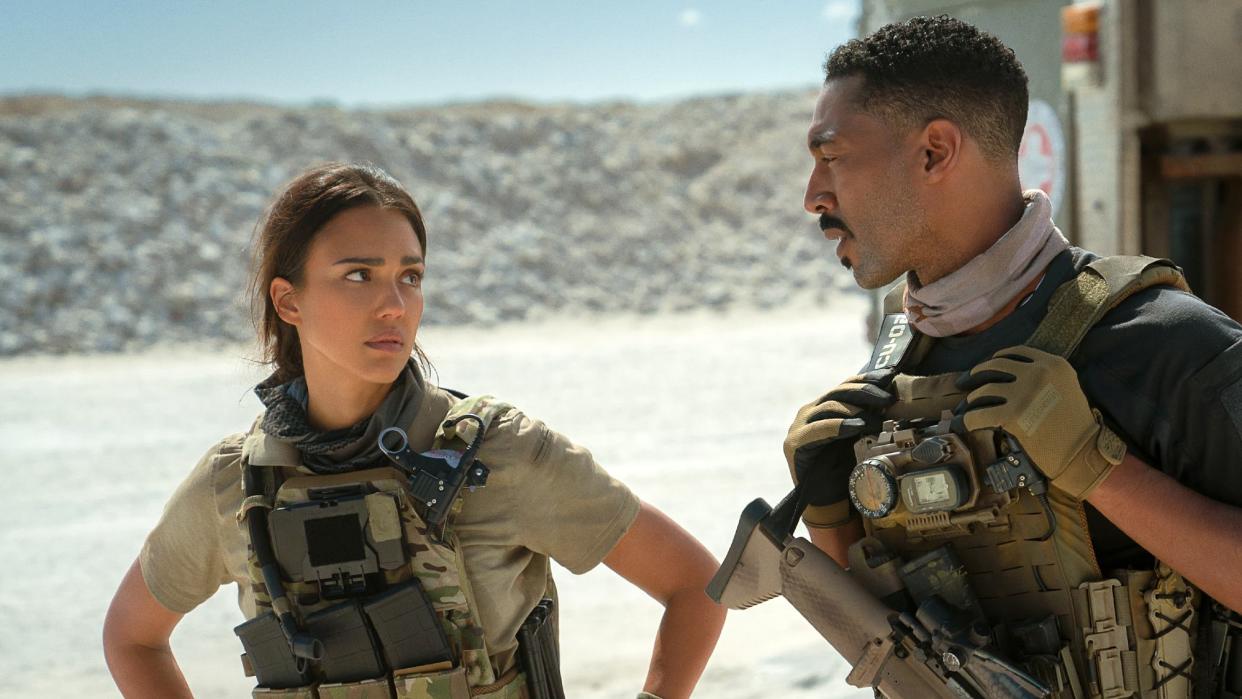  (L-R) Jessica Alba as Parker and Tone Bell as Spider in Trigger Warning. 