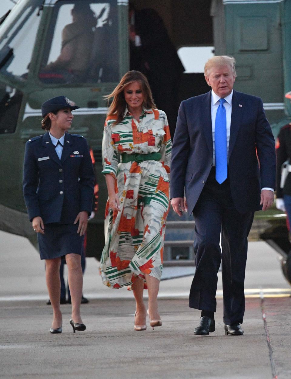 The First Lady paid tribute to London in a landmark-emblazoned dress by Gucci [Photo: Getty]