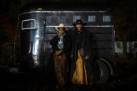 <p>Grandson Javaris and grandfather Rogers pose for a portrait after riding their horses in the Christmas parade in Cleveland, Miss., Decemeber 2017. (Photograph by Rory Doyle) </p>