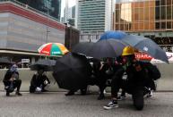 Demonstrators take positions during a protest in Hong Kong