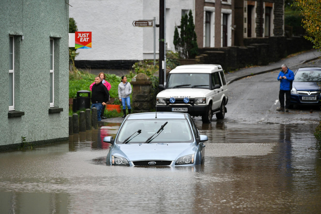 <em>Storm Callum left cars stranded in floodwater in Tonna near Aberdulais, Neath, South Wales (Picture: PA)</em>