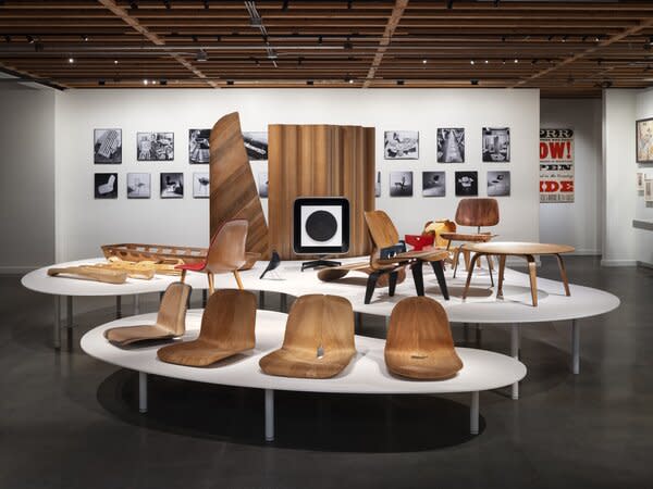 Early prototypes of molded plywood chairs are on display in the gallery, revealing the design couple’s iterative process.