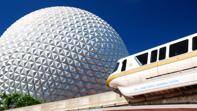 Monorail passing in front of Spaceship Earth at Epcot Center in Walt Disney World