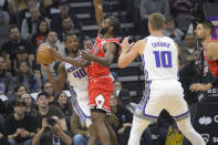 Sacramento Kings forward Harrison Barnes (40) prepares to pass the ball past Chicago Bulls forward Patrick Williams (44) during the first quarter of an NBA basketball game in Sacramento, Calif., Sunday, Dec. 4, 2022. (AP Photo/Randall Benton)