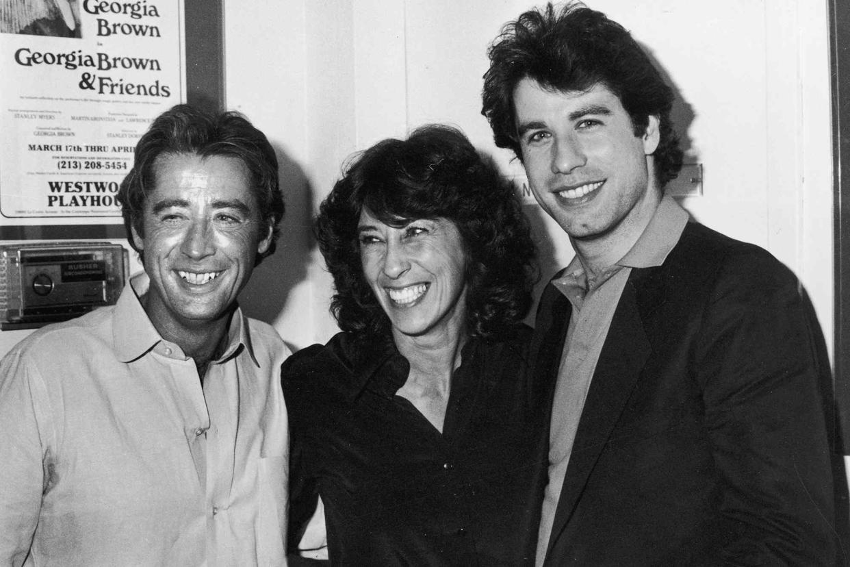 <p>Frank Edwards/Fotos International/Getty</p> John Travolta poses with his sister Ellen Travolta, and his brother Sam Travolta, backstage at the Westwood Playhouse in July 1981.