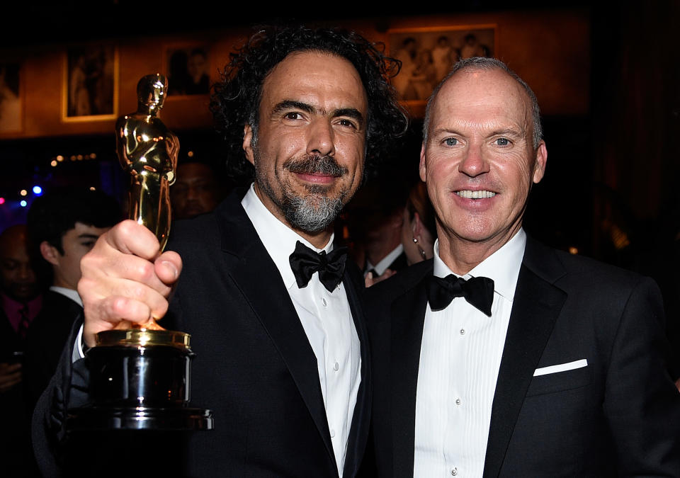 HOLLYWOOD, CA - FEBRUARY 22:  (L-R) Director Alejandro Gonzalez Inarritu, winner of Best Original Screenplay, Best Director, and Best Motion Picture, for 'Birdman' and actor Michael Keaton attend the 87th Annual Academy Awards Governors Ball at Hollywood & Highland Center on February 22, 2015 in Hollywood, California.  (Photo by Kevork Djansezian/Getty Images)