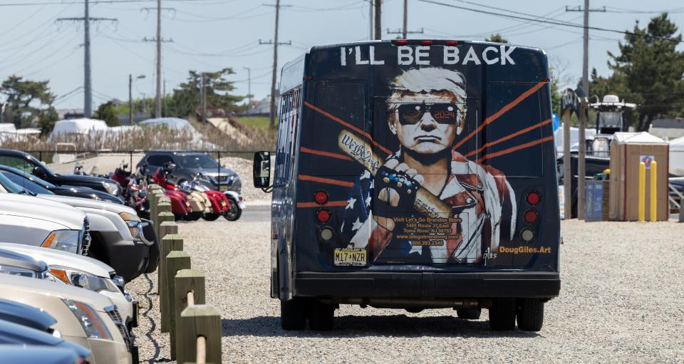 Maga faithful gather for both a boat /motorcycle rally and meet up ending at the Boatyard Marina in Stafford Township on June 4, 2022. 