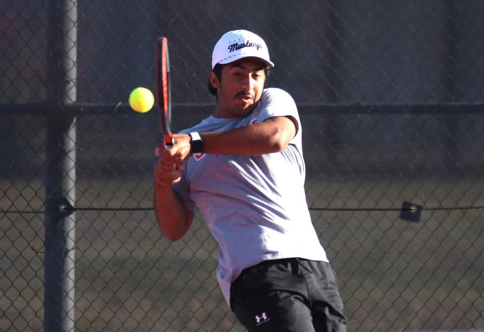 Coronado's Daniel Warraich hits the ball in the Region I-5A tennis tournament Thursday, May 9, 2024, at McLeod Tennis Center.