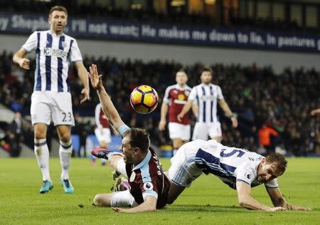 Britain Football Soccer - West Bromwich Albion v Burnley - Premier League - The Hawthorns - 21/11/16 Burnley's Ashley Barnes in action with West Bromwich Albion's Craig Dawson Reuters / Darren Staples Livepic