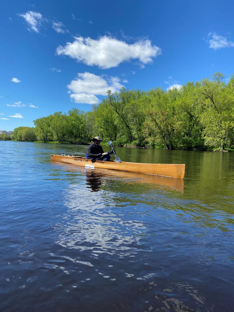 Dr. Joe Spennetta takes a short breather midway through his quest to set the fastest known time paddling the Wisconsin River.