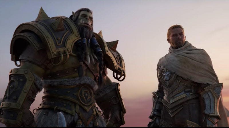 Anduin and Thrall look at something in the distance off-screen.