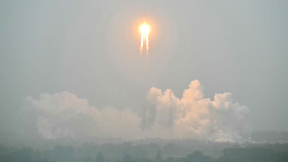 Space fans gathered to watch the launch on south China's Hainan Island - Hector Retamal/AFP/Getty Images