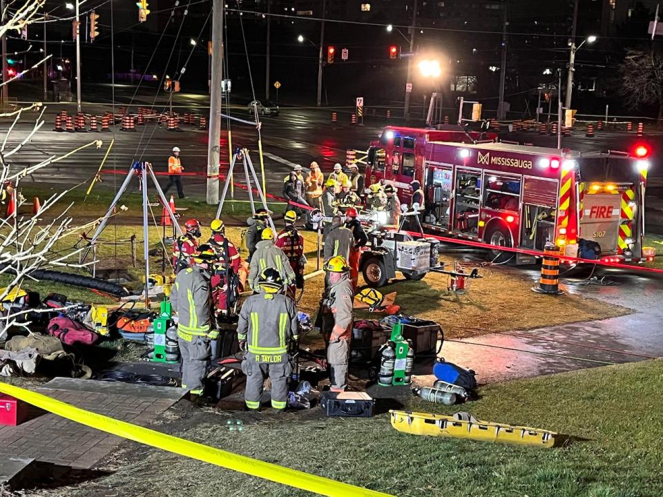 Emergency crews at the scene of an industrial accident in Mississauga that left a 54-year-old worker dead.  (Alexis Raymon/CBC - image credit)