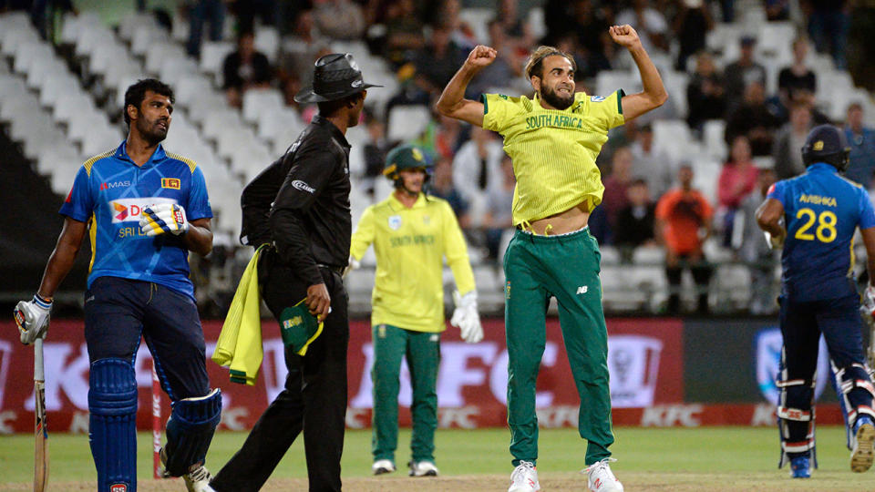 Imran Tahir celebrates. (Photo by RODGER BOSCH/AFP/Getty Images)