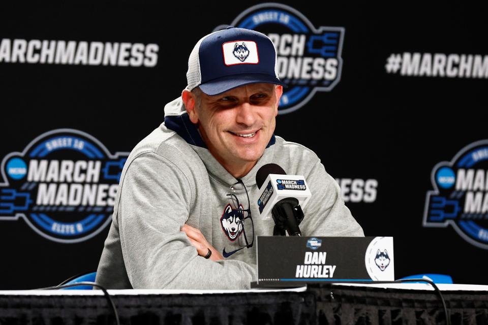 Connecticut head coach Dan Hurley smiles at a reporter's question at a news conference before their practice in preparation for their East semifinal game against San Diego State at TD Garden in Boston on March 27, 2024.