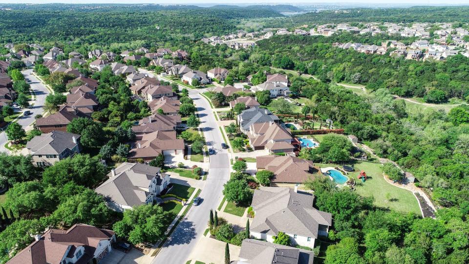 Cedar Park , Texas a suburb of Austin, TX aerial drone amazing view Suburban Luxury Homes in Spring time green aerial drone view of Suburb Houses and suburbia neighborhood near Lake Travis - Image.