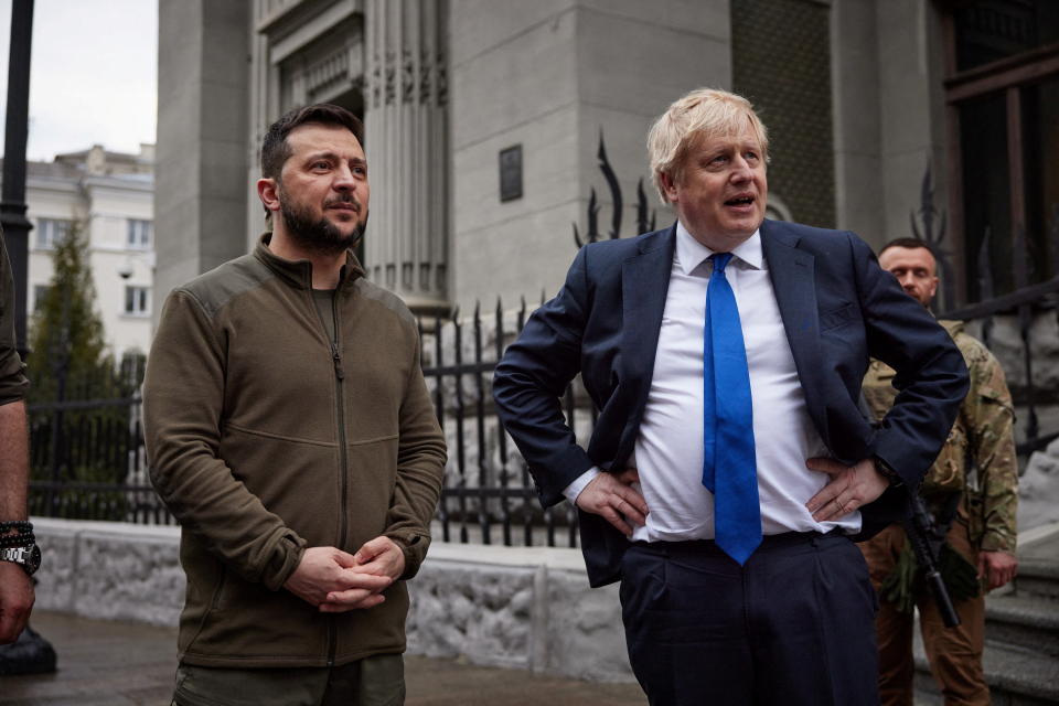 Ukraine's President Volodymyr Zelenskiy and British Prime Minister Boris Johnson stand in front of the Presidential Office building after walking in central Kyiv, as Russia's attack on Ukraine continues, Ukraine April 9, 2022. Ukrainian Presidential Press Service/Handout via REUTERS ATTENTION EDITORS - THIS IMAGE HAS BEEN SUPPLIED BY A THIRD PARTY. MANDATORY CREDIT