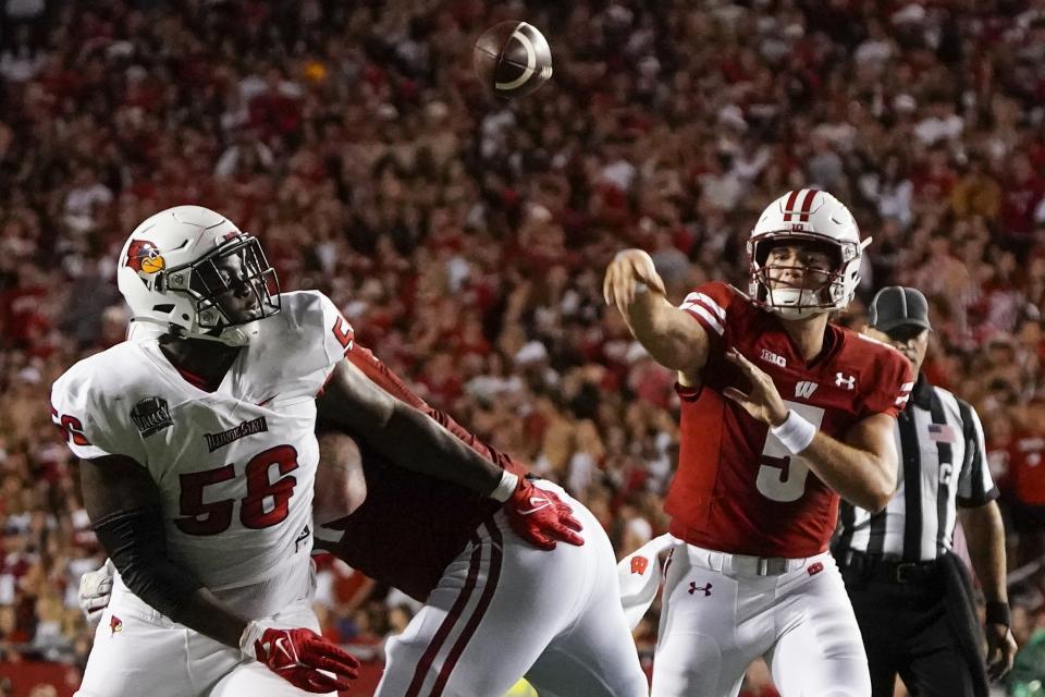 Wisconsin's Graham Mertz (5) throws a pass during the second half of an NCAA college football game against Illinois State Saturday, Sept. 3, 2022, in Madison, Wis. (AP Photo/Morry Gash)