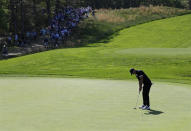 Brooks Koepka putts on the sixth green during the third round of the PGA Championship golf tournament, Saturday, May 18, 2019, at Bethpage Black in Farmingdale, N.Y. (AP Photo/Seth Wenig)