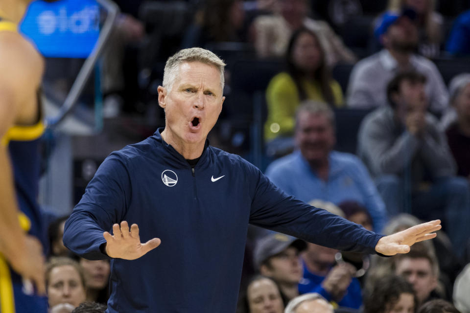 Golden State Warriors coach Steve Kerr reacts after a foul call during the second half of the team's NBA basketball game against the Dallas Mavericks in San Francisco, Saturday, Dec. 30, 2023. (AP Photo/John Hefti)