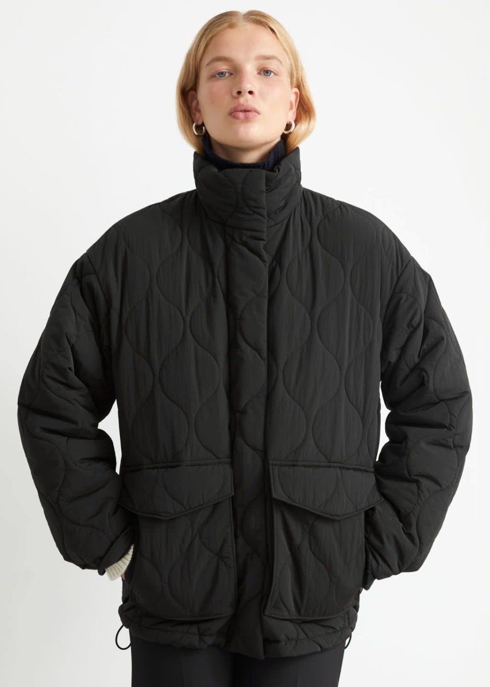 Complete with a high collar (so I wouldn’t need to faff around with a scarf) and big pockets (very useful, obvs), this quilted jacket looks ultra cosy.<br><br><strong>& Other Stories</strong> Quilted Zip Jacket, $, available at <a href="https://www.stories.com/en_gbp/clothing/jackets-coats/jackets/product.quilted-zip-jacket-black.0981077001.html" rel="nofollow noopener" target="_blank" data-ylk="slk:& Other Stories" class="link rapid-noclick-resp">& Other Stories</a>