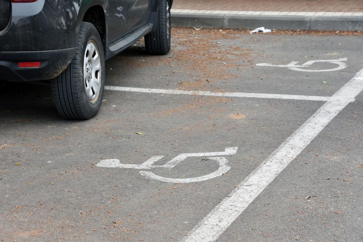 Car Double parking on Handicapped parking spots