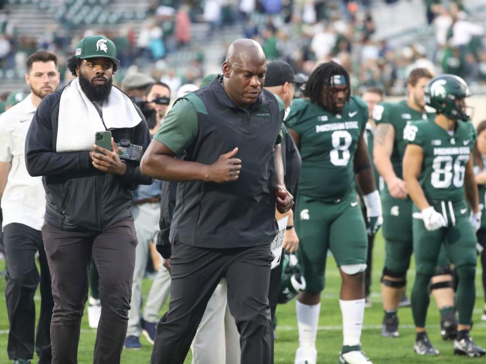 Michigan State Spartans head coach Mel Tucker runs off the field after the 34-7 loss to the Minnesota Golden Gophers at Spartan Stadium, Saturday, Sept. 24, 2022.