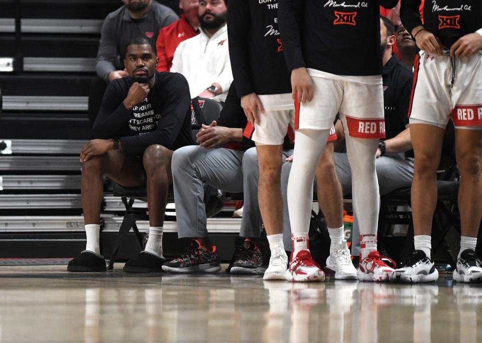 Texas Tech's forward Devan Cambridge (35) sits on the bench during the Big 12 basketball game against Cincinnati, Saturday, Feb. 3, 2024, at United Supermarkets Arena.