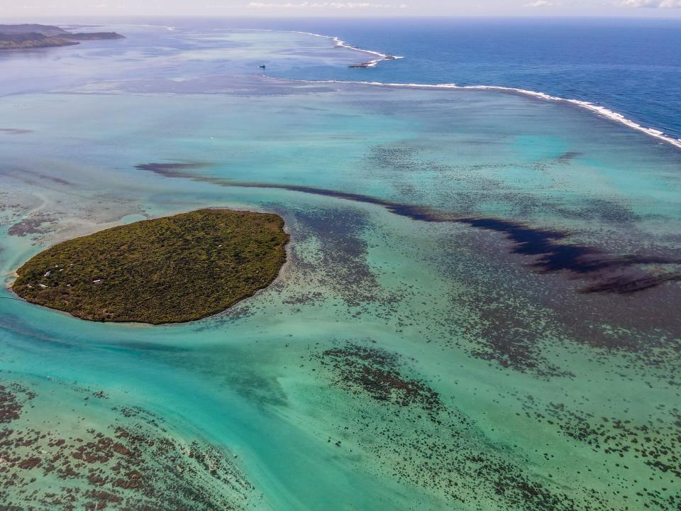 Leaked oil spills from the vessel off the coast of Mauritius.