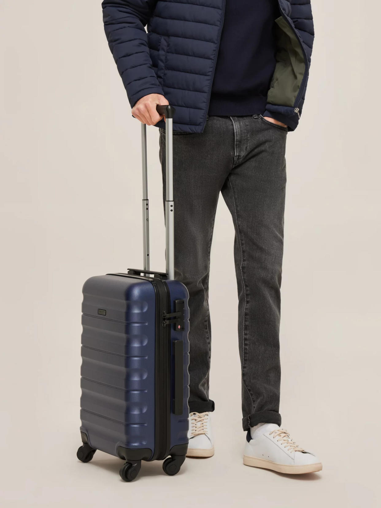 Shop the best-selling suitcase in a range of four colours: black, grey, navy and red. (John Lewis)