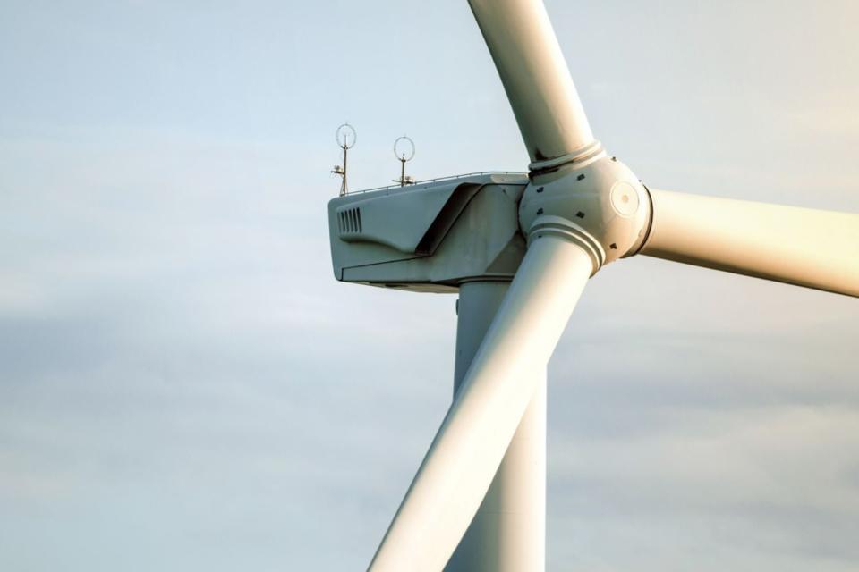 A close up of a wind turbine.