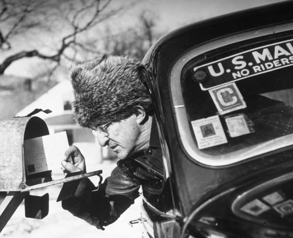 Rural Vermont mailman Mark Whalon makes rounds in sub-zero weather. (Alfred Eisenstaedt—Time & Life Pictures/Getty Images) <br> <br> <a href="http://life.time.com/history/the-postal-service-classic-photos/#1" rel="nofollow noopener" target="_blank" data-ylk="slk:Click here to see the full collection at LIFE.com;elm:context_link;itc:0;sec:content-canvas" class="link ">Click here to see the full collection at LIFE.com</a>