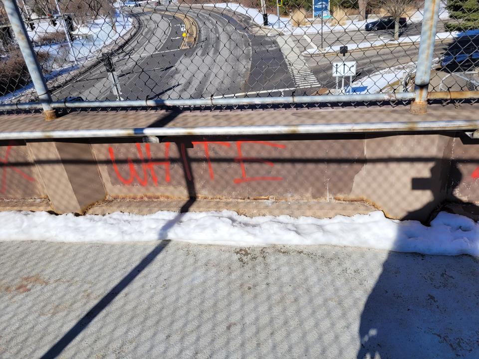 New hateful graffiti was found on a pedestrian bridge in Portsmouth on Friday, March 3, 2023, days after numerous downtown buildings and places of worship were targeted with similar vandalism.