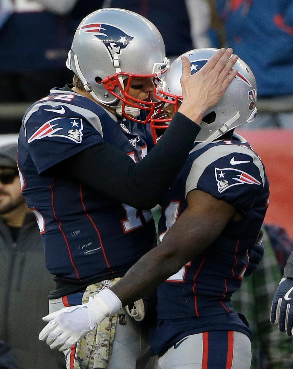 Tom Brady celebrates a TD pass to Brandin Cooks during his four-TD performance.