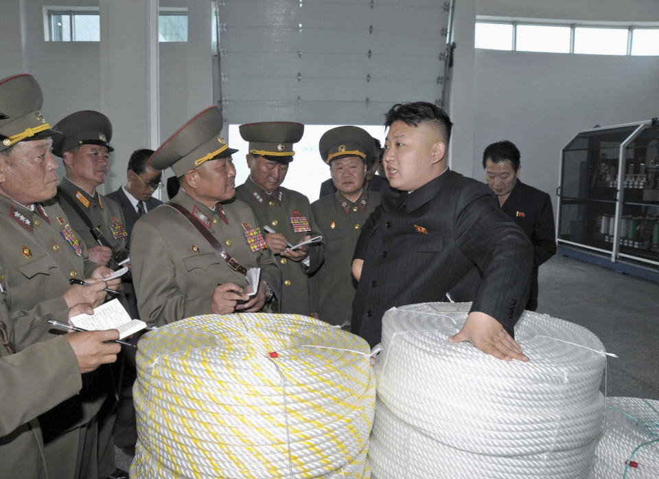 North Korean leader Kim Jong&nbsp;Un visits the Seong-cheon River Fishnet Factory and Plastic Factory in June of 2013.