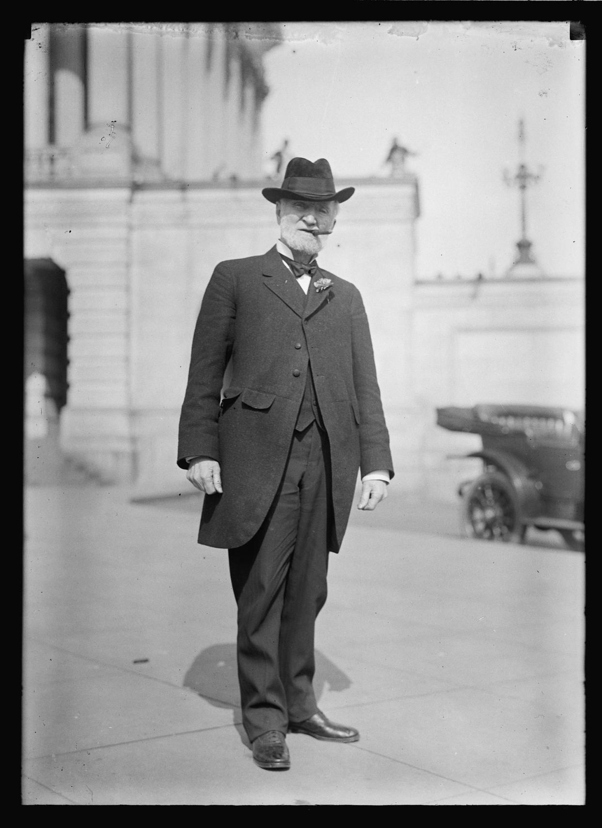 Joseph G. Cannon poses for a photograph with a cigar. (Harris & Ewing Collection / Library of Congress)
