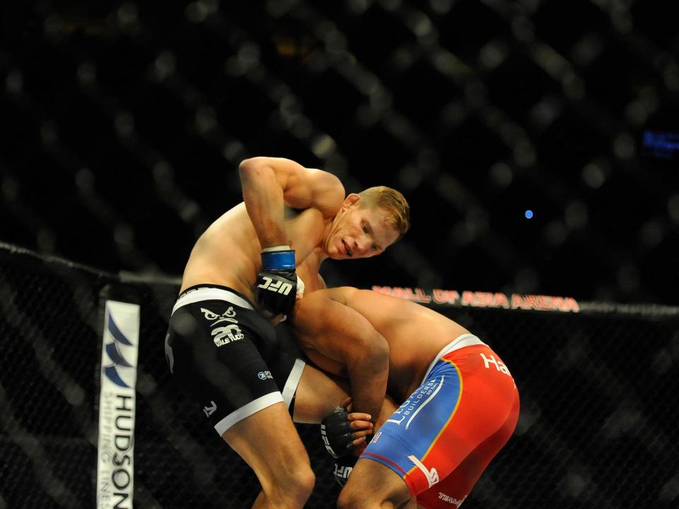 Luke Barnatt grapples with Mark Munoz during their bout at the UFC Fight Night in May 2015: Getty
