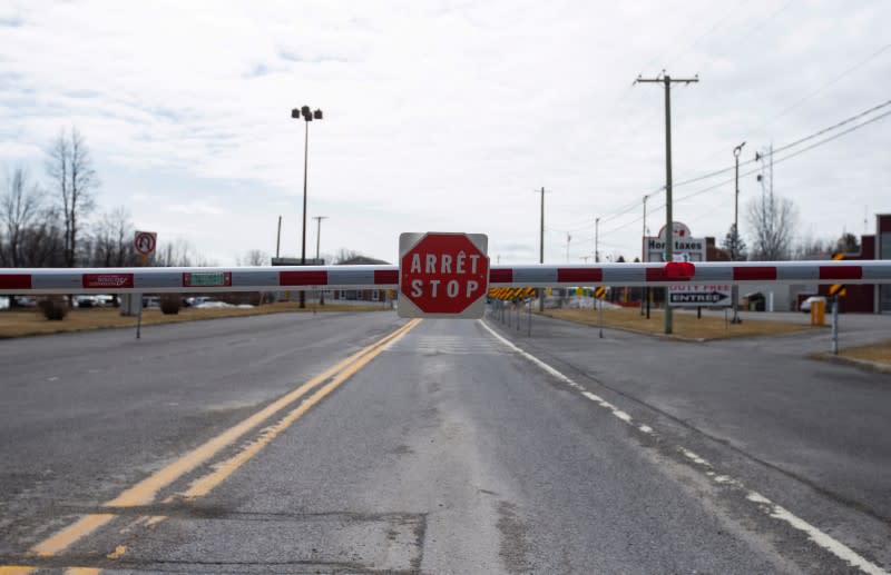 FILE PHOTO: An empty border crossing at the U.S.-Canada border in Lacolle, Quebec