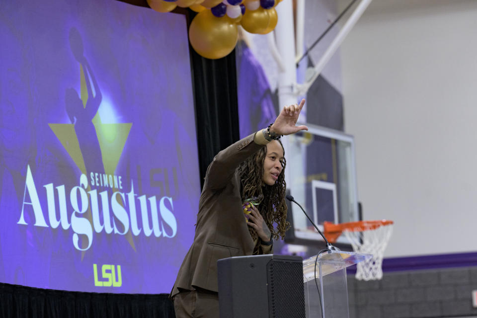 Seimone Augustus, a former LSU player who lead her team to multiple final fours and a Minnesota Lynx player who won four WNBA Championships, speaks before her statue unveiling at the LSU campus on Sunday, Jan. 15, 2023, in Baton Rouge, La. (AP Photo/Matthew Hinton)