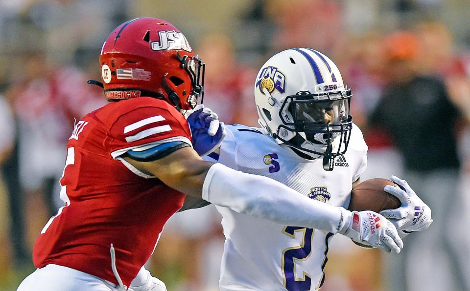 North Alabama's ShunDerrick Powell tries to evade the tackle of Jacksonville State's Yessman Green during college football action against Jacksonville State on Sept. 18, 2021, at Burgess-Snow Field at JSU Stadium in Jacksonville, Alabama.