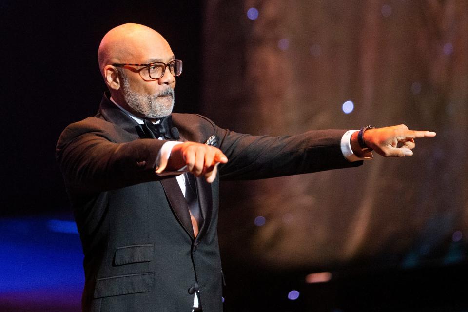 Russ Wigginton, president of the National Civil Rights Museum, points to the audience while speaking during the Freedom Award ceremony at The Orpheum in Downtown Memphis, on Thursday, October 19, 2023.