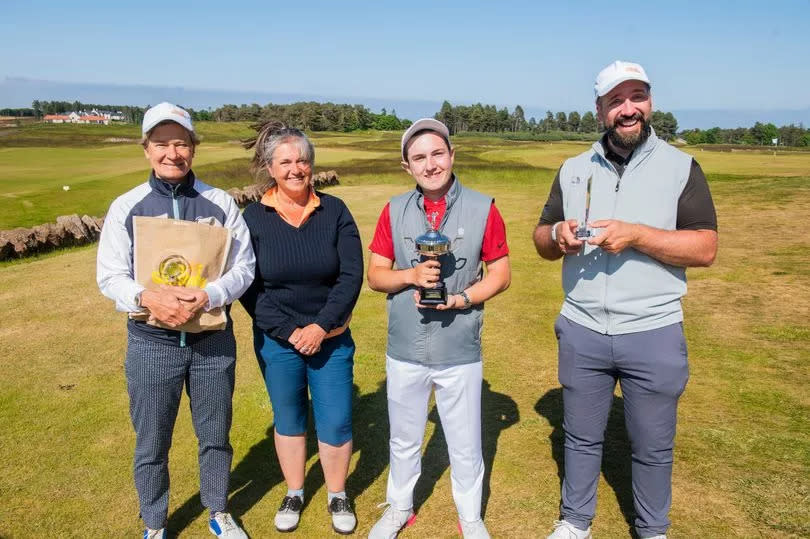 Oliver with mum and golfers