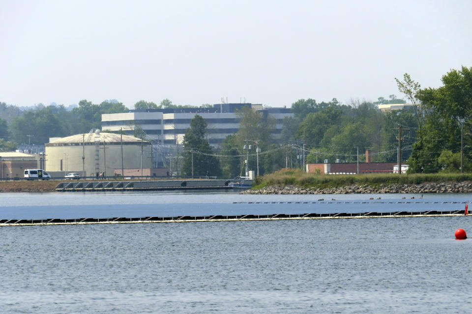 Solar panels from a project at a water treatment plant are shown Tuesday, June 6, 2023, in Millburn, N.J., that provides enough electricity to power 95% of the treatment facilities electrical needs. (AP Photo/Wayne Parry)