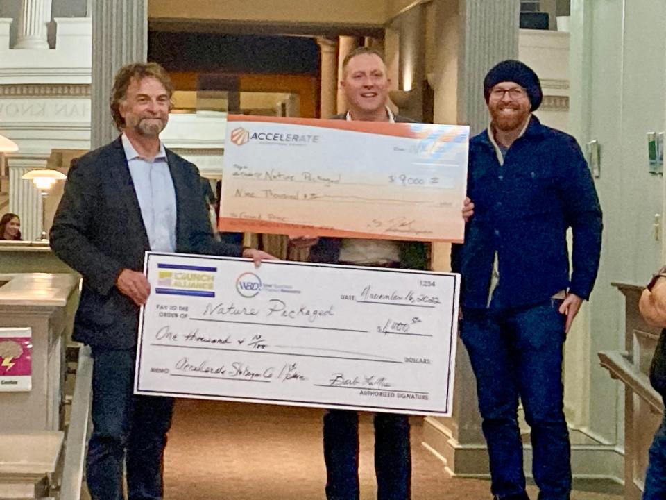 Dan TenNapel (middle) stands with WBD's Mark Mauer (left) and SCEDC's Ray York (right) at the Accelerate Sheboygan County Pitch Competition.