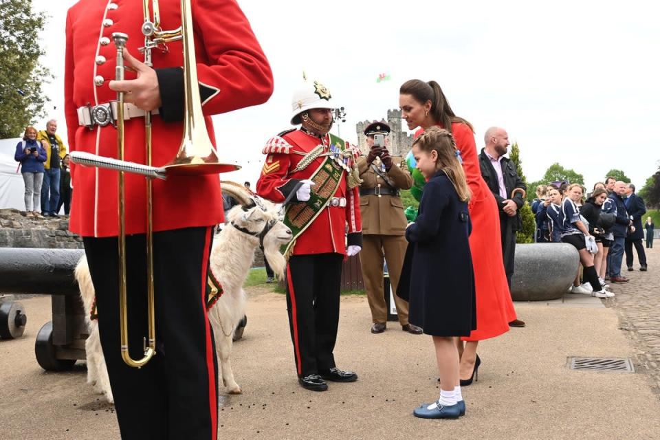 The Duchess of Cambridge and Princess Charlotte meet The Royal Welsh mascot Lance Corporal Shenkin II (Ashley Crowden/PA) (PA Wire)