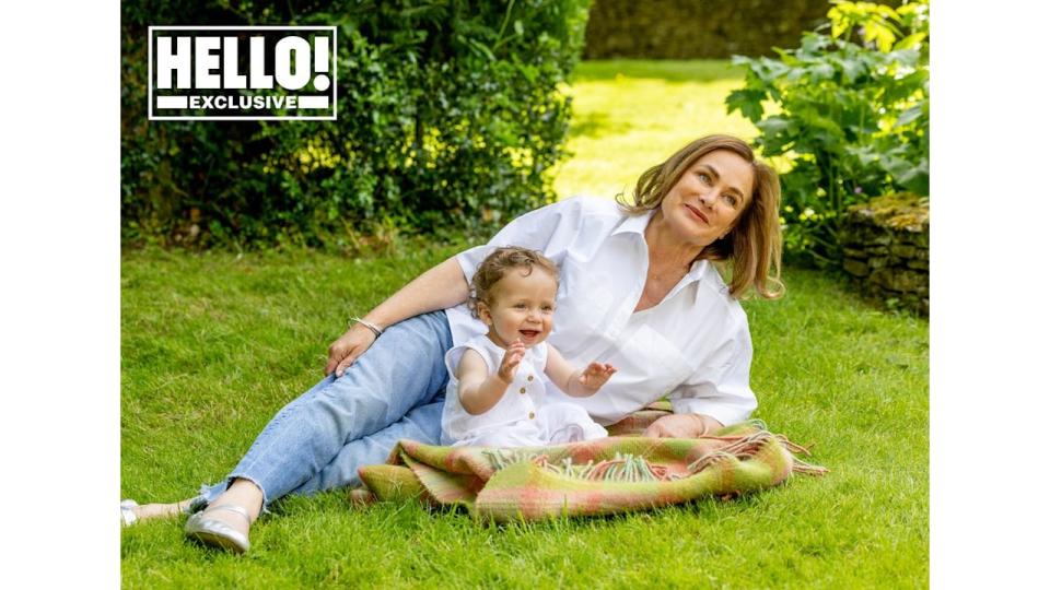 Penelope Chilvers at Cotswolds home with grandchild