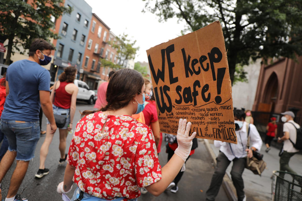 Members of the teachers union, parents and students participate in a march through Brooklyn, New York, on Sept. 1 to demand a safer teaching environment for themselves and students during the COVID-19 pandemic. (Photo: Spencer Platt via Getty Images)