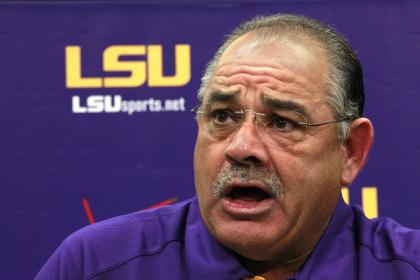 In this Aug. 7, 2012, file photo, LSU defensive coordinator John Chavis talks during an NCAA college football media day in Baton Rouge. (AP Photo/Gerald Herbert, File)