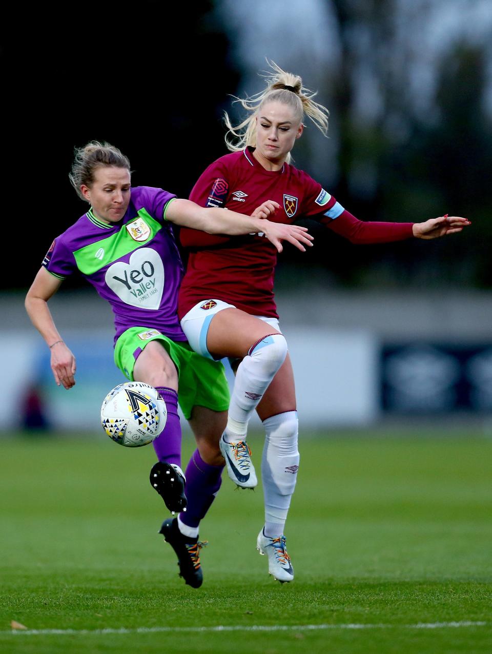 ROMFORD, ENGLAND - NOVEMBER 25: Alisha Lehmann of West Ham battles with Frankie Brown of Bristol City during the FA WSL match between West Ham United Women and Bristol City Women at Rush Green on November 25, 2018 in Romford, England. (Photo by Jordan Mansfield/Getty Images)